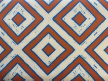 Grafische hippe print felblauw en oranje